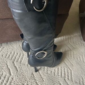 Sleek Black Heeled Boots with Silver Accents